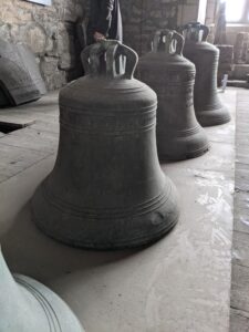 A row of old church bells stored in the tower of Dundee Parish Church (St Mary's)
