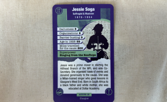 jessie M Soga Suffragette Card, green and purple top trump like card.