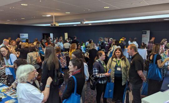 The CILIPS24 exhibition hall filled with delegates at a breaktime.