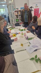 Local photographer Steve Elliott leading a workshop at the Drying Green Herbarium at Inverclyde Libraries, supported by the Green Libraries Scotland Grant Fund.